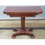 A 19th century mahogany fold over games table,