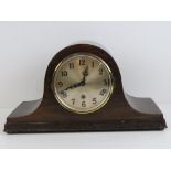 A c1930s three train eight day striking Napoleon hat mantle clock.