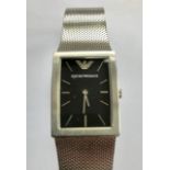 An Emporio Armani gentleman's stainless steel dress watch having black-ground square shaped dial