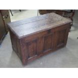 A good country made late 18th century oak coffer back having field moulded panels to the front,