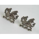 A pair of silver cuff links in the form of Welsh Dragons, stamped 925.