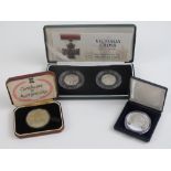 Four silver proof coins;