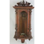 A Vienna clock case, movement deficient but retaining gong, 90cm in length, a/f.