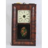 A patent brass clock by the Ansonia Brass and Copper Company having eight day striking movement,