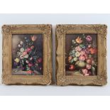 A pair of decorative floral oleographs 20 x 15cm.