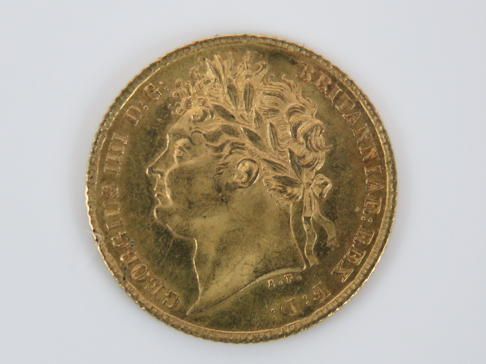 A 22ct gold George III 1825 half sovereign, 4g, in protective plastic pod.