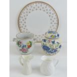 A Dresden hand painted floral two handled bowl, together with a contemporary Worcester cream jug,