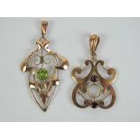 Two 9ct gold art nouveau pendants of floral form,