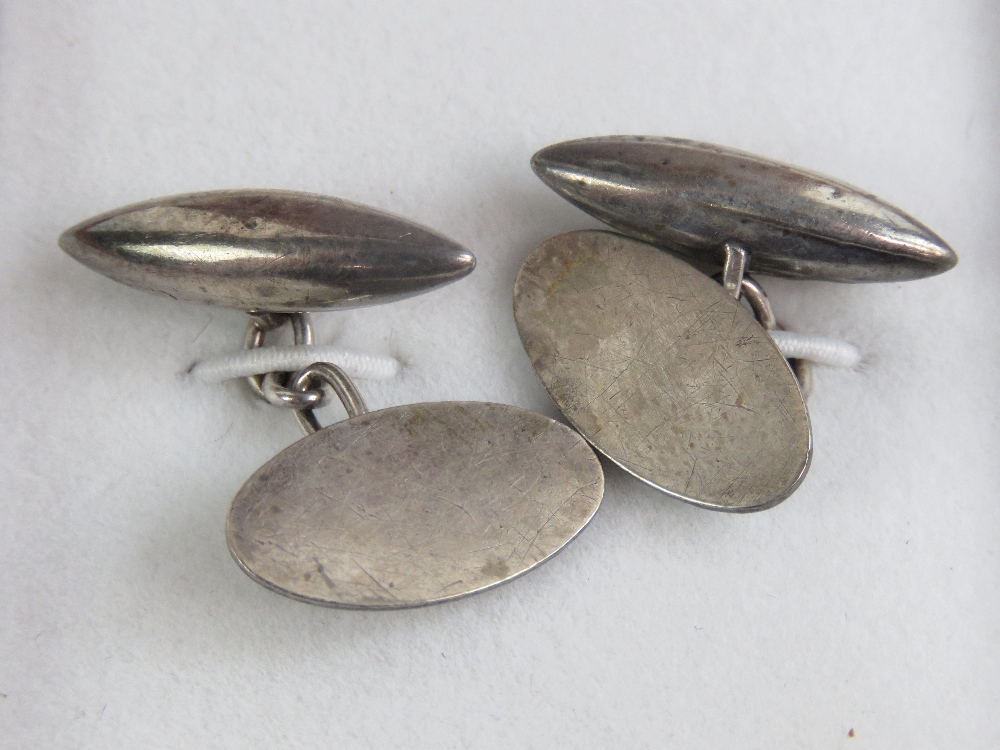 A pair of HM silver cuff links of oval form, unengraved, hallmarked Birmingham 1929,