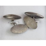 A pair of HM silver cuff links of oval form, unengraved, hallmarked Birmingham 1929,