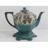 A Victorian hexagonal teapot and stand in turquoise with early transfer print, 20cm high.