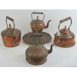 Three assorted 19th century copper antique kettles, together with a spirit kettle. Four items.