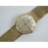 A vintage 9ct gold Omega automatic wristwatch on 9ct gold strap,