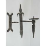 A blacksmith made wall sconce candle pricket, together with a wall hook. Two items.