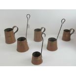 Three graduated copper ale tankards, together with three graduated cider measures, 20th century.