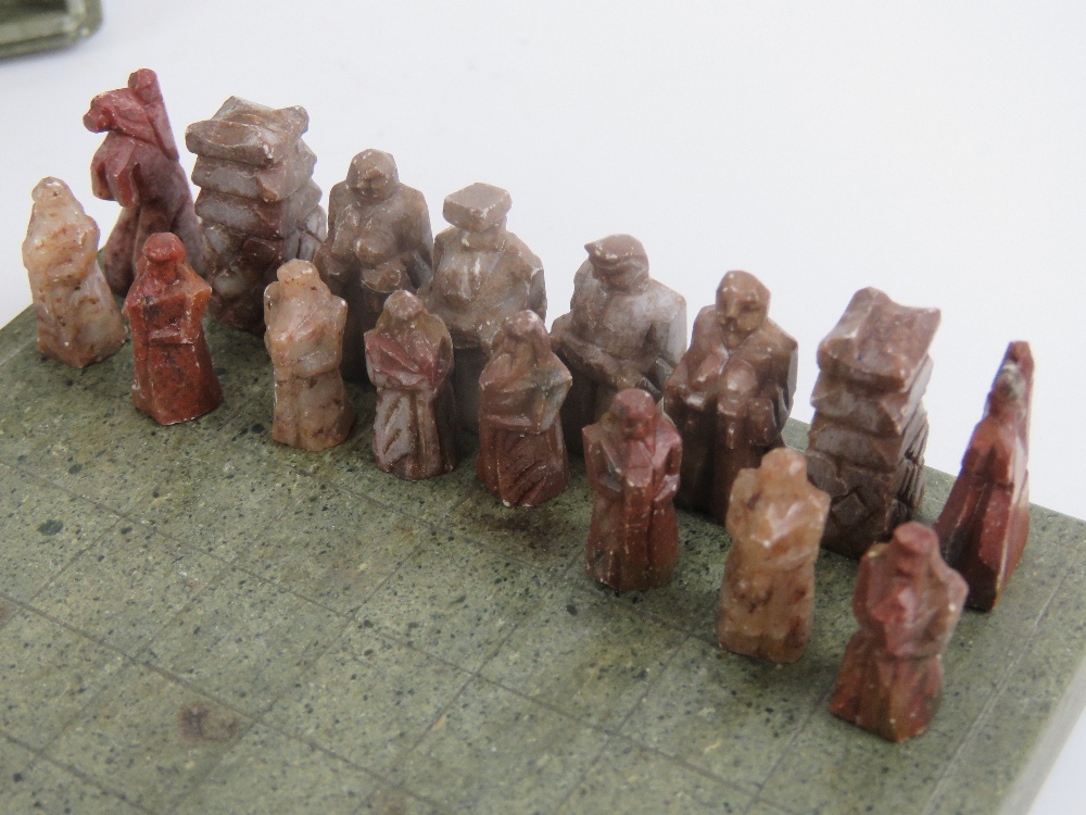 A 20th century Oriental carved stone miniature chess set in case, 10cm square. - Image 3 of 5