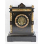 A smart polished slate and marble Victorian eight day striking mantel clock having gilded Roman