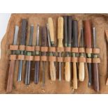 An interesting estate wood workers leather tool roll opening to reveal vintage 'J.B.