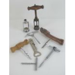 A quantity of seven assorted late 19th and 20th century corkscrews.