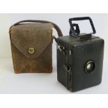 A Zeiss Ikon box tengor vintage camera with pigskin case, 9cm high.