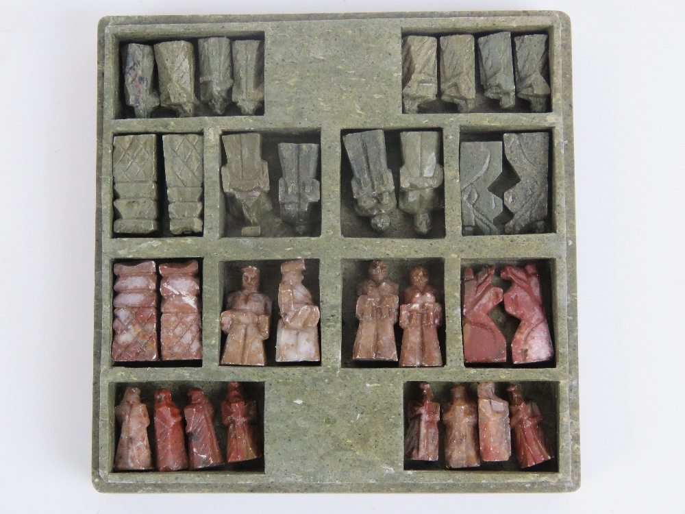 A 20th century Oriental carved stone miniature chess set in case, 10cm square. - Image 4 of 5