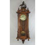 A two train eight day striking Vienna wall clock,