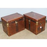 A fine pair of 'Army & Navy' style leather covered lidded trunks having brass Royal Corps of