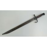 A WWII Japanese Arisaka bayonet, blade measuring 39.5cm with scabbard.