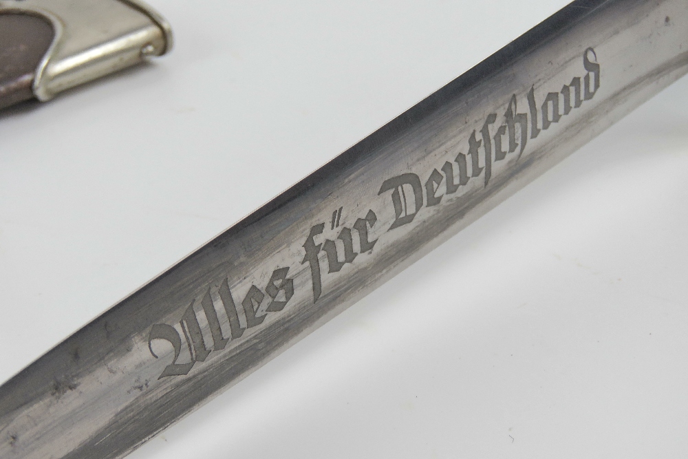 A WWII German SA dagger with full Rhom inscribed blade, having makers mark for E. - Image 5 of 10