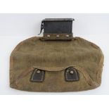 A WWII MG34 spent case catcher.