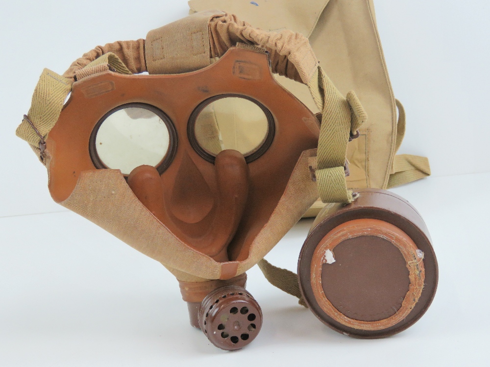 A WWII Japanese civilian gas mask with filter and carry bag with label. - Image 5 of 6