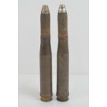 Two German 20mm inert shells with heads.