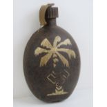 A German Afrika Korp Bakelite water bottle having DRGM maker mark upon and dated 1942,