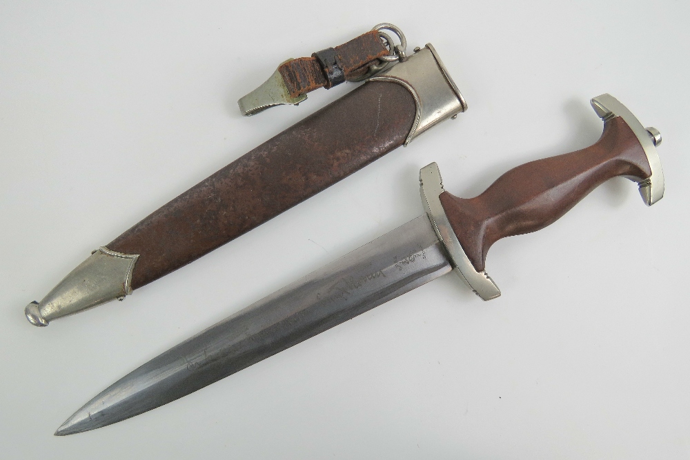 A WWII German SA dagger with full Rhom inscribed blade, having makers mark for E. - Image 2 of 10