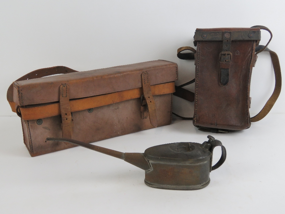 A WWII Australian Military Vickers .303 spares pouch dated 1944. Together with a leather Vickers .