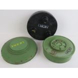 Three inert training land mines.