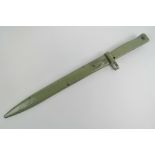 A WWI German Ersaz bayonet with scabbard having green paint upon, blade measuring 31.5cm in length.