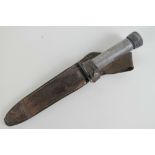 An unusual dagger having hollow tube grip opening to reveal compass within,
