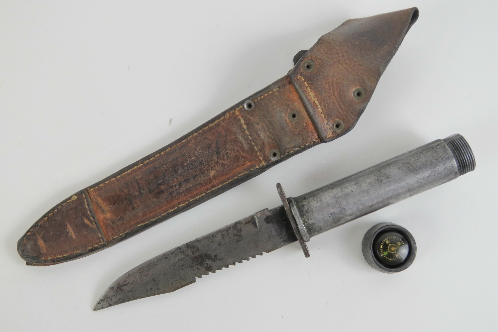 An unusual dagger having hollow tube grip opening to reveal compass within, - Image 2 of 3