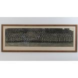 A vintage black and white British Army Regiment photograph, 75 x 20cm, framed and glazed.