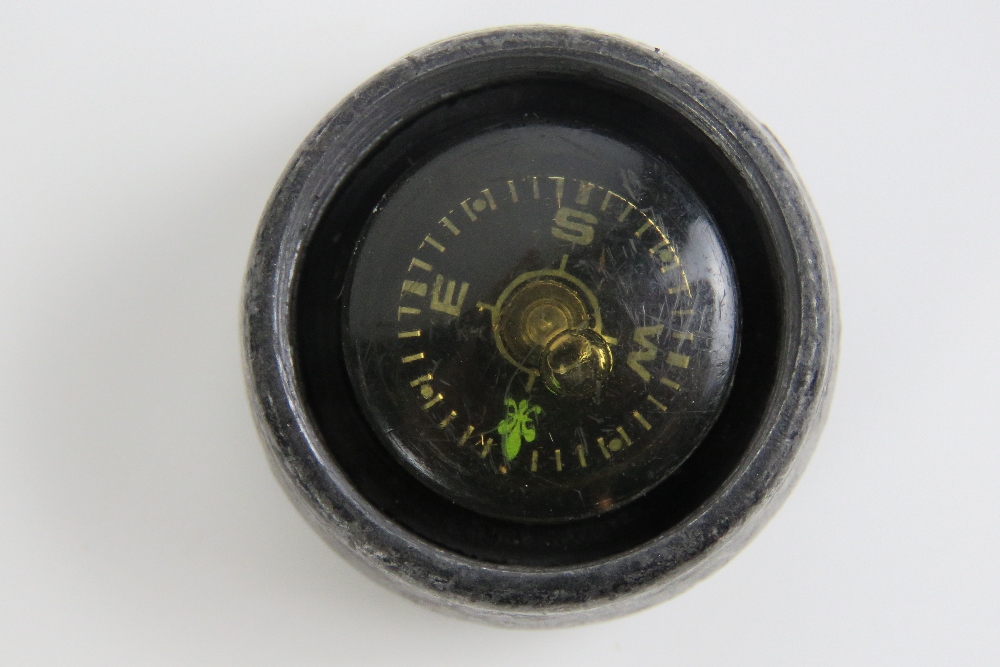 An unusual dagger having hollow tube grip opening to reveal compass within, - Image 3 of 3