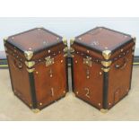 A fine pair of 'Army & Navy' style lidded travel trunks having brass Royal Military College badge