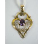 A 9ct gold Edwardian pendant having cent