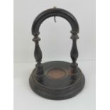 An ebonised pocket watch stand a/f.