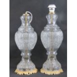 A fine pair of lead crystal cut glass baluster table lamp bases for rewiring each raised over gilt
