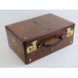 A fine leather covered dispatch box having five brass military badges upon and brass studwork