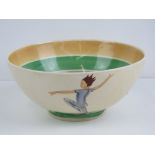 A rare Susie Cooper bowl 'Puck' decorated with hand painted figures upon, damage repaired, a/f,