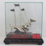 A white metal Chinese Dhow model ship having presentation inscription for 1993,