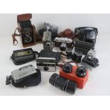 A quantity of assorted camera equipment including; Voitlander box camera, Helena 35k, Cinecamera,