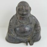 A 19th century bronze seated Buddha figurine, 1.42kg, 13cm high.